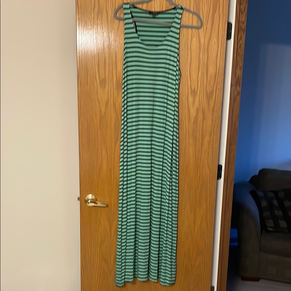 The Limited Green Maxi Sundress with Halter Neckline and Sleeveless Design